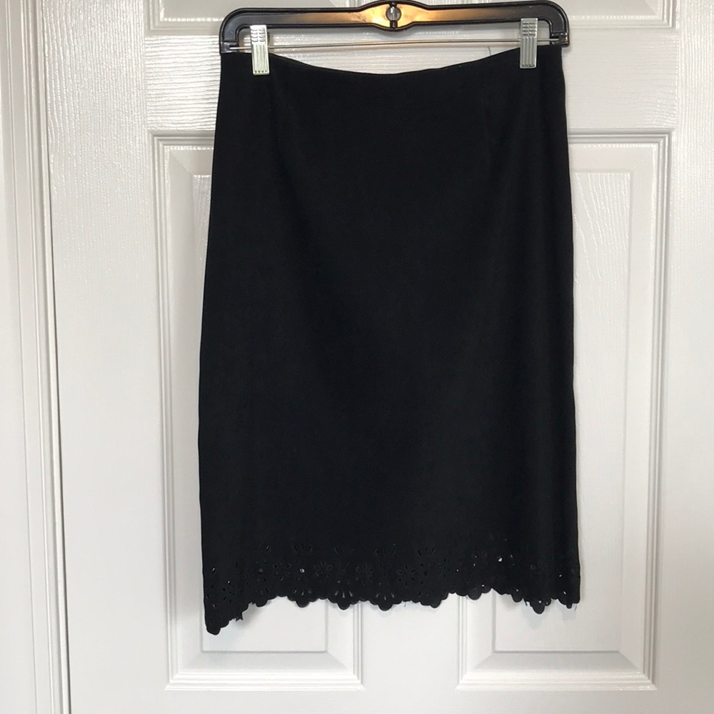 Ballinger black skirt with eyelet cut hem.